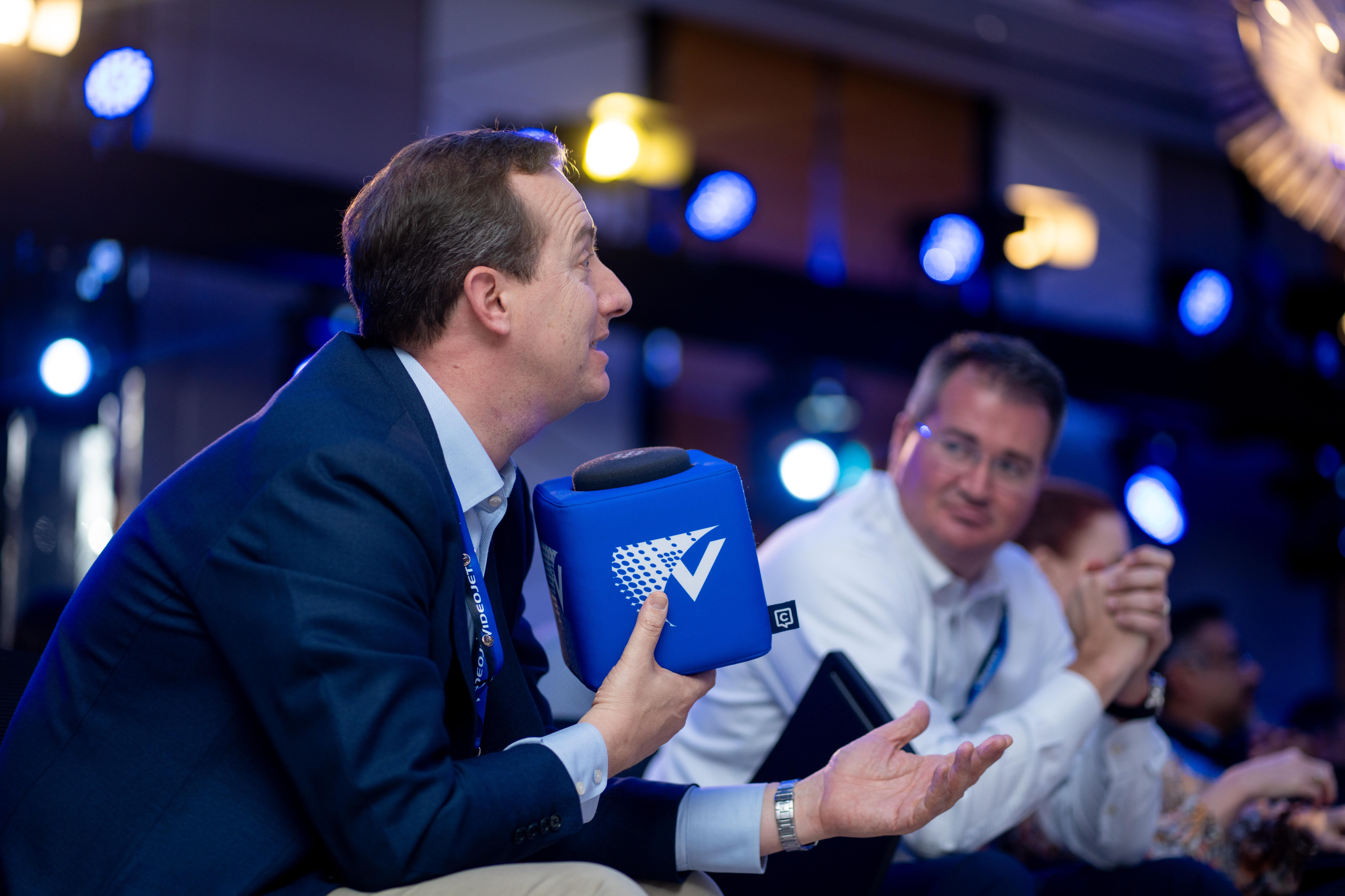 Corporate meeting and conference event in Dubai with attendees engaging in discussion